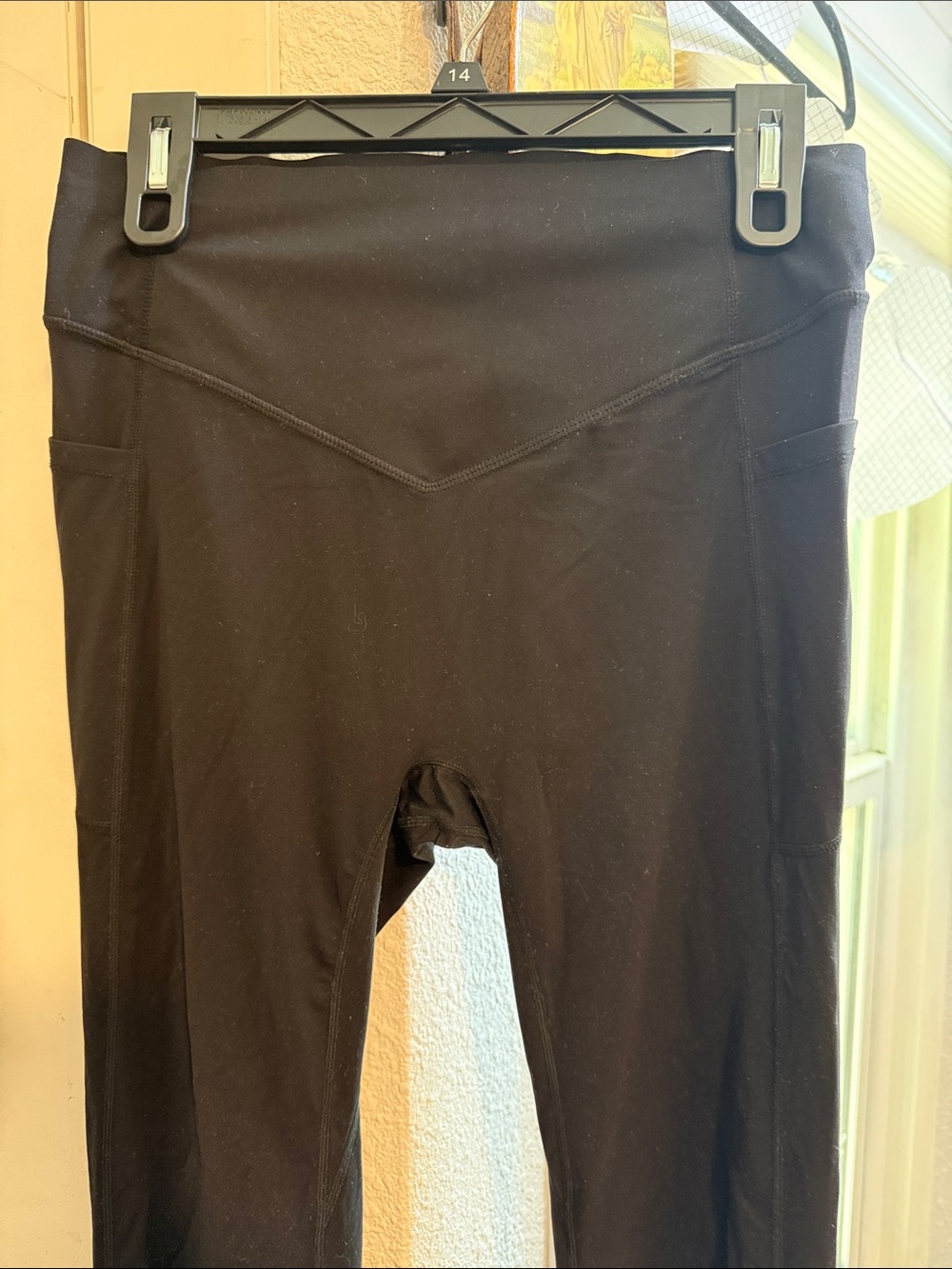 Halara Black High-Waist butt scrunch flare with pocket
